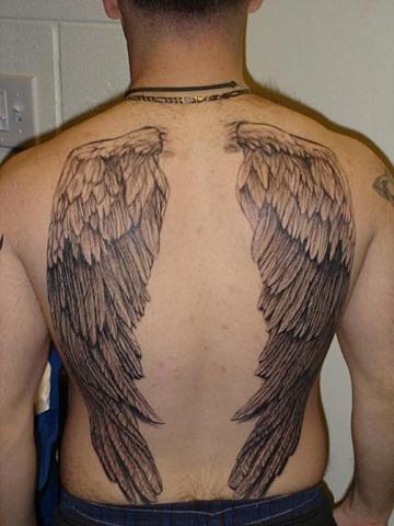 Αρσενικά τατουάζ στο πίσω μέρος. Δημοφιλή σκίτσα